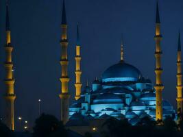 il ipnotizzante vista di il blu della moschea minareto illuminato contro il sera cielo ai creare foto
