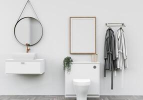 bagno con lavabo con accappatoi e portafoto a parete foto