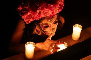 Calavera catrina seduta su un' trono. zucchero cranio trucco. dia de los muertos. giorno di il morto. Halloween. foto