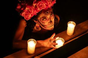 Calavera catrina seduta su un' trono. zucchero cranio trucco. dia de los muertos. giorno di il morto. Halloween. foto