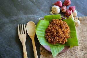 abon fatto di carne, tritato carne piatti fatto con Marrone zucchero e essiccato, conservato Alimenti. indonesiano asiatico cibo foto