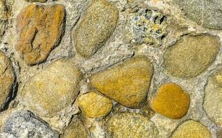 struttura dettaglio di parete con rocce pietre mattone mattoni Messico. foto