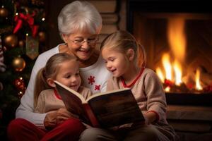 nonna lettura un' libro con sua nipoti nel davanti di un' camino foto