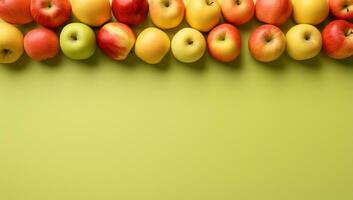 riga di mele su verde sfondo ai generato foto