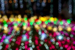 sfocato e bokeh di Natale vacanza illuminazioni modello sfondo foto