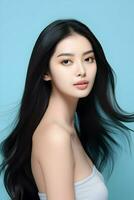 giovane asiatico bellezza donna modello con lungo capelli con coreano trucco su un' blu sfondo. alto qualità. ai generativo foto