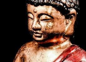 un' vicino su di un' Budda statua foto