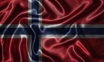 carta da parati con la bandiera della norvegia e sventolando la bandiera con il tessuto.