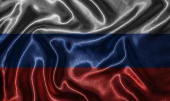 carta da parati della bandiera della russia e sventolando la bandiera del tessuto. foto