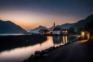 un' piccolo villaggio si siede su il riva di un' lago a tramonto. ai-generato foto