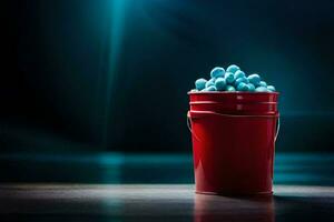 un' rosso secchio pieno con blu palle. ai-generato foto