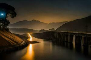 un' ponte al di sopra di un' fiume a notte con montagne nel il sfondo. ai-generato foto