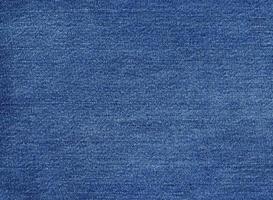 fondo di struttura del tessuto di cotone dei jeans blu foto