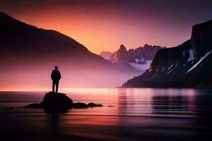 un' uomo sta su un' roccia nel davanti di un' lago a tramonto. ai-generato foto