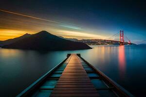 un' lungo molo con un' ponte al di sopra di acqua a tramonto. ai-generato foto