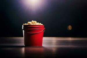 un' rosso secchio pieno con Popcorn su un' buio pavimento. ai-generato foto