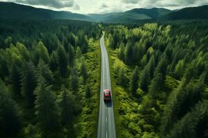 aereo Visualizza di verde foresta e rosso auto su il strada. uccelli occhio. generativo ai. foto