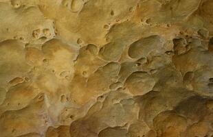 combinazione di pietra sollievo piace un' arancia pianeta superficie. Marrone pietra con anormale sollievo forma foto
