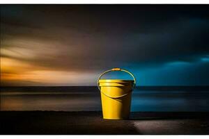 un' giallo secchio seduta su il spiaggia a tramonto. ai-generato foto