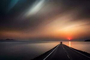 un' lungo strada principale per il oceano a tramonto. ai-generato foto