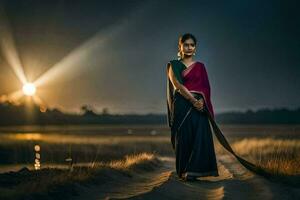 un' bellissimo donna nel un' sari in piedi nel il sabbia. ai-generato foto