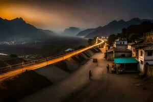 un' strada nel il montagne a crepuscolo. ai-generato foto