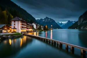 un' lago e un' montagna villaggio a notte. ai-generato foto