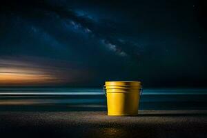 un' giallo secchio si siede su il spiaggia a notte. ai-generato foto