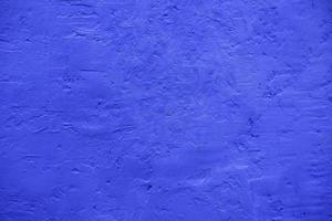 parete blu ruvida con texture foto