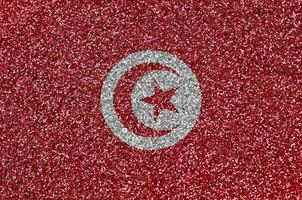 tunisia bandiera raffigurato su molti piccolo brillante paillettes. colorato Festival sfondo per festa foto