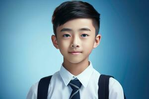 contento scuola allievo, asiatico ragazzo su isolato su studio sfondo con copia spazio, indietro per scuola. ai generativo foto