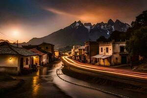 un' strada nel il montagne a crepuscolo con leggero sentieri. ai-generato foto