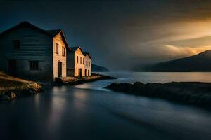 un' Casa si siede su il riva di un' lago a tramonto. ai-generato foto