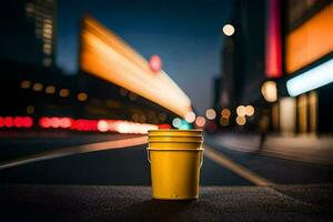 un' giallo tazza seduta su il strada a notte. ai-generato foto