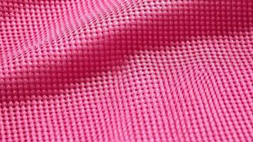 rosa calcio tessuto struttura con aria maglia. atletico indossare fondale foto
