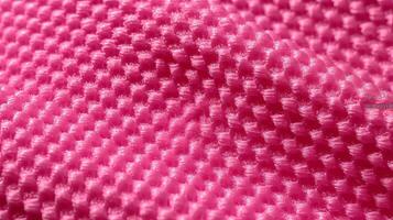 rosa calcio tessuto struttura con aria maglia. abbigliamento sportivo sfondo foto