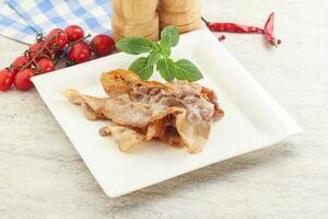 pancetta di maiale fritta a colazione foto