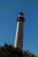 Questo è capo Maggio punto faro nel nuovo maglia. io amore il bianca Guarda di suo Torre e il rosso superiore per esso quello sta su a partire dal così molti. Questo faro di speranza aiuta persone a mare per navigare. foto