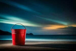 un' rosso secchio su il spiaggia a notte. ai-generato foto