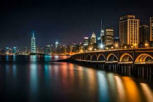 il città orizzonte a notte con un' ponte al di sopra di acqua. ai-generato foto