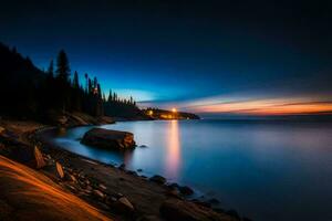 un' bellissimo tramonto al di sopra di il acqua e rocce. ai-generato foto