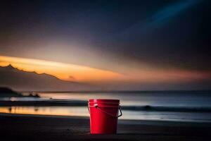 un' rosso secchio su il spiaggia a tramonto. ai-generato foto