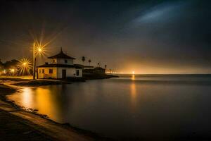 un' faro si siede su il riva di un' corpo di acqua a notte. ai-generato foto