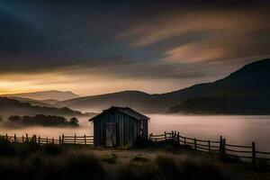 un' piccolo baracca si siede su il bordo di un' lago a tramonto. ai-generato foto