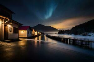 un' lago e case a notte con il aurora luci. ai-generato foto