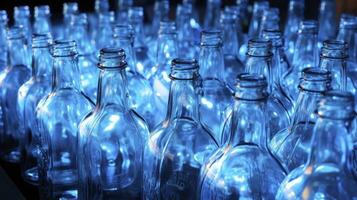 retroilluminato blu plastica bottiglie disposte orizzontalmente. ai generato foto
