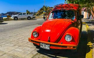 puerto escondido oaxaca Messico 2023 colorato sintonizzato vecchio classico Vintage ▾ auto macchine puerto escondido Messico. foto