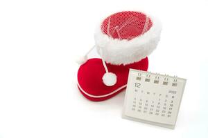 dicembre calendario Immagine con Babbo Natale scarpa isolato su bianca sfondo. Natale sfondo. foto