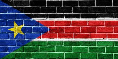bandiera di repubblica di Sud Sudan su un' strutturato sfondo. concetto collage. foto