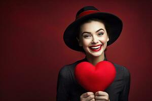 ritratto di un' contento donna con rosso cuore su un' rosso background.valentine's giorno concetto ai generato foto